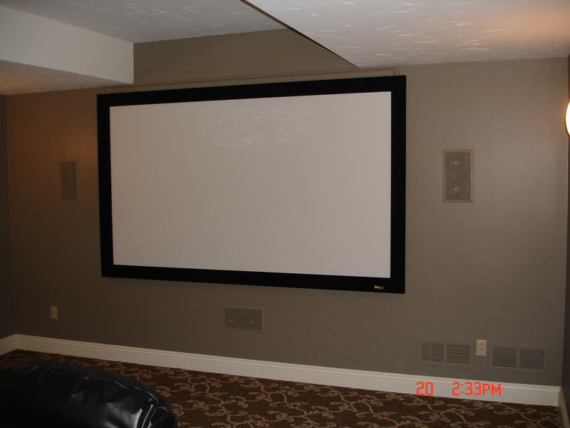 A 106 inch fixed screen with in-wall speakers